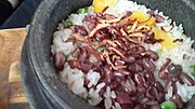 Thumbnail for File:Jabgokbap steamed in stone pot.jpg