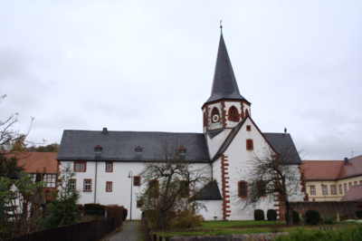 Former monastery church and today's parish church from the monastery garden with former monastery wall from the south.  In the background on the right the provost castle