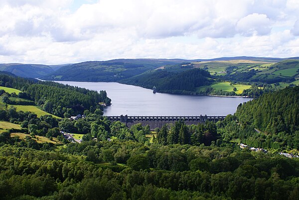 Lake Vyrnwy Reservoir. The dam spans the Vyrnwy Valley and was the first large stone dam built in the United Kingdom.