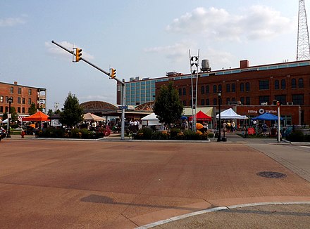 Unveiled in June 2012, Larkin Square is a public green space inspired by the plans of the Larkin Soap Company to build an outdoor plaza for its employees (the unrealized original was to be built on what's now the site of Engine 32/Ladder 5 Firehouse, just off the right margin of this photo). Today, aside from being a pleasant break-time hangout for workers at the nearby office buildings, Larkin Square also boasts a series of restaurants and recreational facilities, and plays host to a busy weekly schedule of special events such as the Thursday-night Larkin Market, seen here.