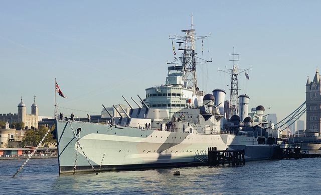 HMS Belfast, one of the last surviving light cruisers. She carries 12 6-inch guns and displaces 11,553 tons – "light" in World War II referred to gun 