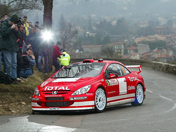 Grönholm with a Peugeot 307 WRC at the 2004 Monte Carlo Rally.