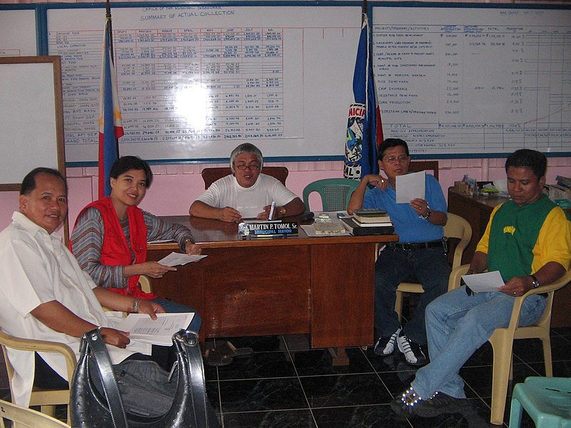 File:Mayor Boy Tomol with NDRRMC.jpg