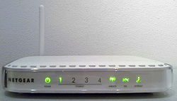 Netgear DG834G v4, in order: the power LED, the 4 Ethernet cable detection LEDs, the wireless power state and activity, the carrier wave LED (off/on) and the PPP LED (off, on, blinking when there's activity). Netgear dg834gv4 front.jpg