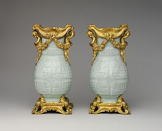 Pair of Chinese vases with French Rococo mounts; the vases: early 18th century, the mounts: 1760–70; hard-paste porcelain with ormolu mounts; 32.4 x 16.5 x 12.4 cm; Metropolitan Museum of Art