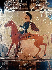 c. 300 BCE Pazyryk felt featuring a moutashed horseman wi pairtially skived heid