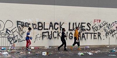 "Black Lives Fucking Matter", "A.C.A.B.", and "Fuck 12" graffiti on a looted Target store on Lake Street, Minneapolis the morning of May 28, 2020