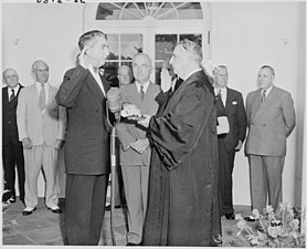 Tom C. Clark being sworn in as an associate justice of the United States Supreme Court by Chief Justice Fred M. Vinson, August 24, 1949 Photograph of Tom Clark being sworn in as an Associate Justice of the United States Supreme Court by Chief Justice... - NARA - 200161.jpg
