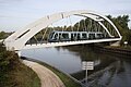 Über die Schelde (Escaut) wird bei Condé-sur-l’Escaut parallel zur Straße eine ehemalige Eisenbahnbrücke genutzt