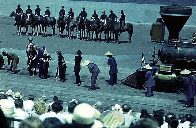 A Golden Spike ceremony reenactment at the 1949 Chicago Railroad Fair, with the Virginia and Truckee railroad's Genoa painted and lettered to resemble