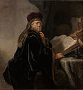 Rembrandt Harmensz van Rijn - Scholar at his Study - Google Art Project.jpg