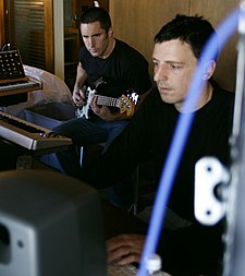 Trent Reznor (left) and Atticus Ross (right), Best Original Score co-winners Reznor Ross G5 setup cropped tight.jpg