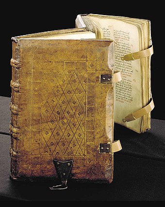 A 1385 copy of the Sachsenspiegel, a German legal code, written on parchment with straps and clasps on the binding