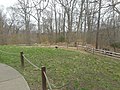 The trail runs to the bottom of the hill behind the house, has a loop section and ends on the west bank of Cold Spring Harbor.