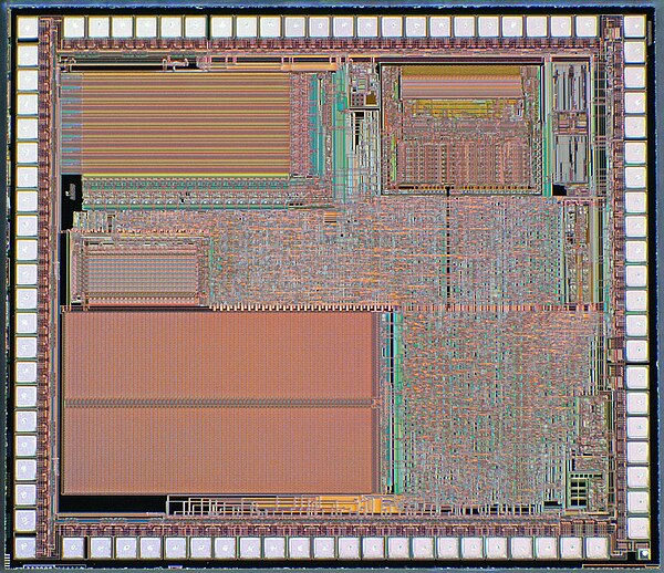 Die photograph of a Sitronix ST2064B microcontroller showing embedded W65C02S core in the upper right