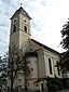 Münchener Straße 2; Grieblweg 5; Katholische Pfarrkirche St. Laurentius, Saalbau mit Satteldach und westlichem Turm mit welscher Haube, historisierend...