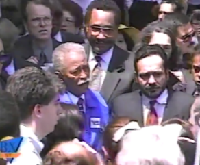 Willie Colón accompanies Mayor David Dinkins during 1992 Washington Heights riots.