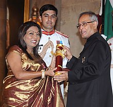 The President, Shri Pranab Mukherjee presenting the Padma Shri Award to Smt. Kalpana Saroj, at an Investiture Ceremony-II, at Rashtrapati Bhavan, in New Delhi on April 20, 2013.jpg