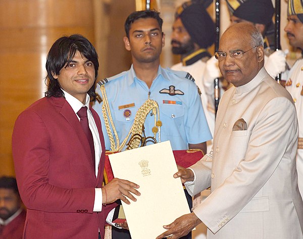 Chopra receiving the Arjuna Award from Ram Nath Kovind, President of India, on 25 September 2018.