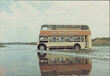 A Top Deck Travel bus crossing a creek in Northern India, 1983 Topdeckbus.jpg