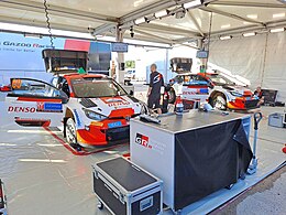 Toyota GR Yaris Rally1 cars in service park on the 2023 rally at the Estonian National Museum. Toyota 2023 RE.jpg