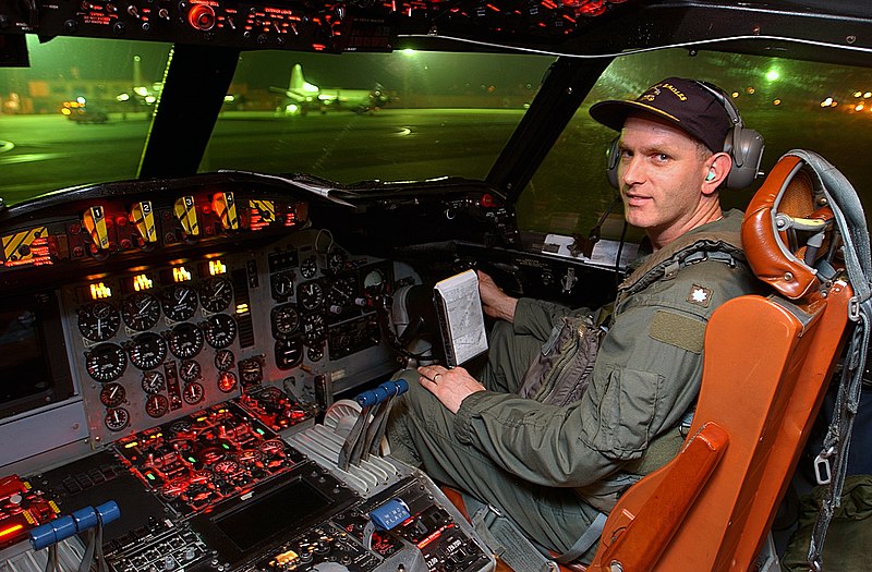 File:US Navy 030408-N-6501M-005 Cmdr. Bradley A. Carpenter conducts post flight checks in the cockpit of his P-3C Orion.jpg