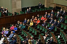 Some opposition members of the Sejm formed a rainbow to protest the 2020 inauguration of President Andrzej Duda. Uroczystosc zaprzysiezenia Prezydenta RP Andrzeja Dudy przed Zgromadzeniem Narodowym (50194732936).jpg