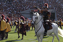 USC mascot Traveler with Trojan Warrior and The Spirit of Troy. Usctravelerandband.jpg