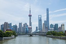 Shanghai is the biggest city by GDP in China (US$664 billion) View of Lujiazui from Zhapu Road Bridge.jpg