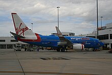 Virgin Blue's 50th Boeing 737 Virgin-ia Blue was the only aircraft in the fleet to be actually painted blue. This aircraft is now in Virgin Australia livery. Virgin Blue (VH-VBY) Boeing 737-7FE at Melbourne Airport.jpg