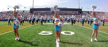 TUMB and Shockwave perform at pregame in Yulman Stadium Yulman Stadium opening day (cheerleaders, band).jpg