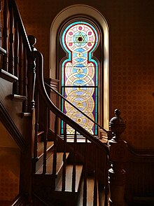 A stained glass window in the synagogue 1 Pane Stained Glass Staircase Window Eldridge Street Synagogue.jpg