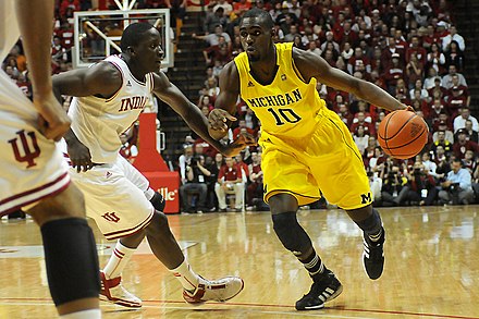 Oladipo (left) guards Tim Hardaway Jr. of the Michigan Wolverines in 2012