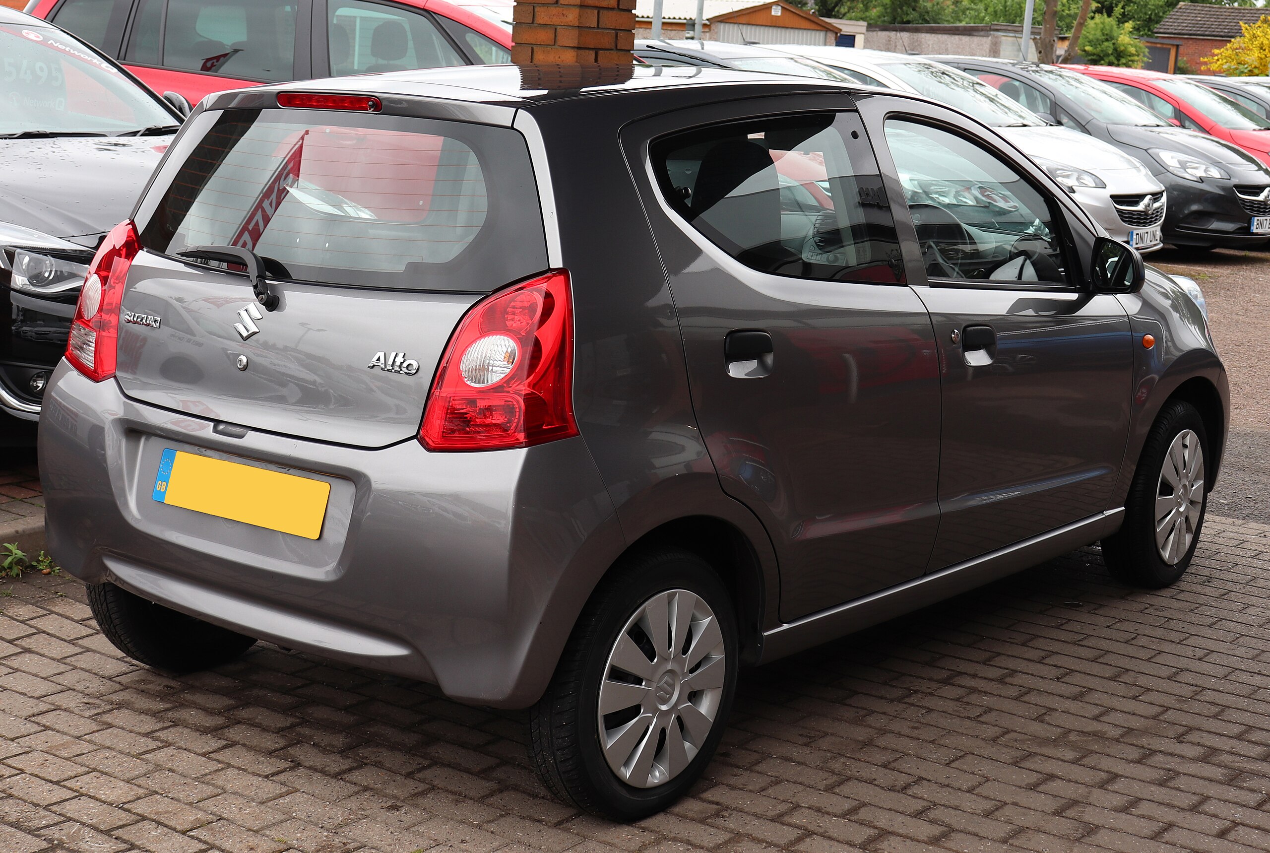 2014 Suzuki Alto compact city car Stock Photo - Alamy