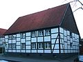 Half-timbered house with a viewer