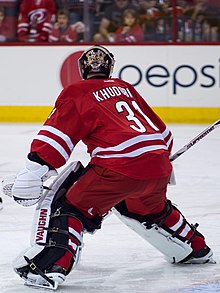 Houston Aeros Goalie Anton Khudobin (30) clears the puck to a team