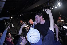 As Friends Rust performing at Shinjuku Nine Spices in Tokyo, Japan on June 12, 2014, as part of the Japan Tour 2014 in promotion of Greatest Hits?. One of only four shows played with drummer Joshua Williams. From left to right: Joseph Simmons, Kaleb Stewart, Damien Moyal, and Williams. As Friends Rust at Shinjuku Nine Spices 2014-2.jpg