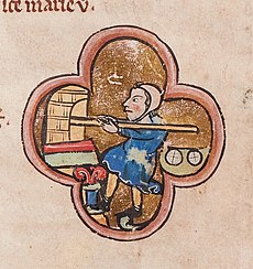Baker baking bread in an oven - miniature in a 13th century psalter.jpg