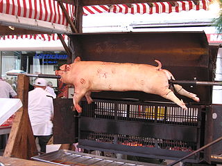 Pig roast Mealtime event roasting a whole pig