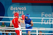 Deutsch: Boxen bei den Olympischen Jugendspielen 2018 Tag 12, 18. Oktober 2018 - Kampf um die Bronzemedaille im Fliegengewicht Mädchen – Timur Merjanow (Usbekistan, rot) schlägt Youssef Ali Karar Ali (Ägypten, blau) 5-0; Ringrichter ist Antonín Gaspar (Tschechien). English: Boxing at the 2018 Summer Youth Olympics on 18 October 2018 – Boy's heavyweight Bronze Medal Bout - Timur Merjanov (Uzbekistan, red) beats Youssef Ali Karar Ali (Egypt, blue) 5-0; Referee is Antonín Gaspar (Czech Republic). Español: Boxeo en los Juegos Olímpicos Juveniles de Verano de 2018 en 18 de octubre de 2018 - Medalla de bronce de peso pesado del muchacho: Timur Merjanov (Uzbekistán, roja) le gana a Youssef Ali Karar Ali (Egipto, azul) 5-0; El árbitro es Antonín Gaspar (Republica checa).