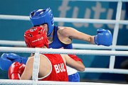 Deutsch: Boxen bei den Olympischen Jugendspielen 2018 Tag 12, 18. Oktober 2018 - Kampf um die Bronzemedaille im Fliegengewicht Mädchen – Heaven Destiny Garcia (USA, blau) schlägt Goryanana Stoeva (Bulgarien, rot) 5-0; Ringrichter ist Ishanguly Meretnyyazov (Turkmenistan). English: Boxing at the 2018 Summer Youth Olympics on 18 October 2018 – Girl's flyweight Bronze Medal Bout - Heaven Destiny Garcia (USA, blue) beats Goryanana Stoeva (Bulgaria, red) 5-0; Referee is Ishanguly Meretnyyazov (Turkmenistan). Español: Boxeo en los Juegos Olímpicos Juveniles de Verano de 2018 en 18 de octubre de 2018 - Combate a medalla de bronce de peso mosca para mujeres: Heaven Destiny Garcia (Estados Unidos, azul) le gana a Goryanana Stoeva (Bulgaria, roja) 5-0; El árbitro es Ishanguly Meretnyyazov (Turkmenistán).