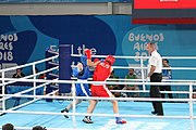 Deutsch: Boxen bei den Olympischen Jugendspielen 2018 Tag 12, 18. Oktober 2018 - Finale Leichtgewicht Mädchen – Oriana Saputo (Argentinien, blau) schlägt Emma Lawson (Australien, rot) 5-0; Ringrichter ist José Romero (Spanien). English: Boxing at the 2018 Summer Youth Olympics on 18 October 2018 – Girls' lightweight Bronze Medal Bout – Oriana Saputo (Argentina, blue) wins over Emma Lawson (Australie, red) 5-0; Referee is José Romero (Spain). Español: Boxeo en los Juegos Olímpicos Juveniles de Verano de 2018 en 18 de octubre de 2018 - Combate de medalla de bronce de las niñas: Oriana Saputo (Argentina, azul) gana a Emma Lawson (Australie, roja) 5-0; Árbitro es José Romero (España).