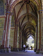 Southern aisle, vaulted before central nave, choir, crossing and transept
