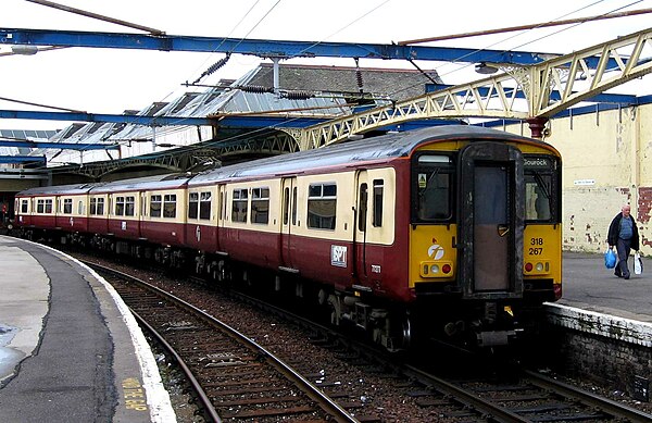Class 318 train at original platform canopies remaining in 2006