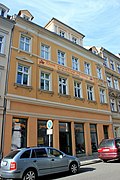 Residential building with shop, in a closed area