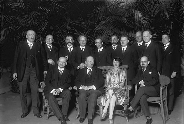Chicherin is in the centre, between German Foreign Minister Gustav Stresemann and his wife, in Berlin in 1928 during a break from German–Lithuanian–So