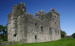 Carnasserie Castle seen from the south-west, with the hall house in the foreground. CarnasserieCastle002.jpg