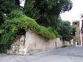 Via Manzoni con tratto di mura difensive