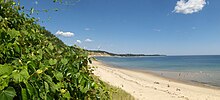 A view of the retreating cliffs along Cape Cod Bay, made up of deposits from the last glaciation Cedarvillecapecodbay.jpg