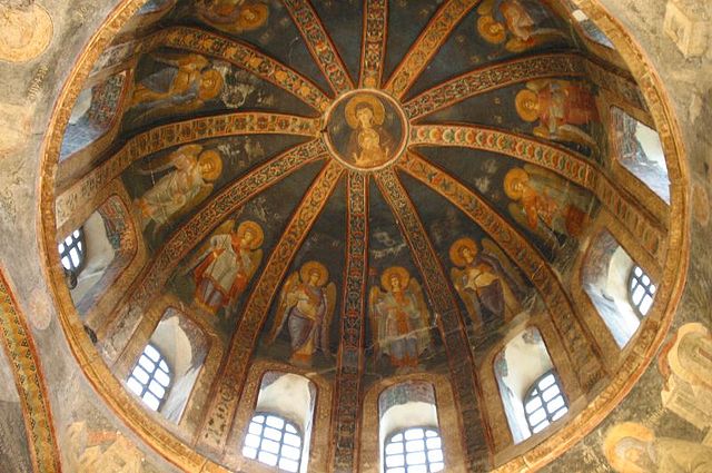 A dome at Chora Church, with ribs from between the drum windows converging on a circular fresco image